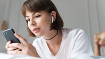 Are Your Earbuds Slowly Damaging Your Hearing? A Surgeon Explains What's Really Happening