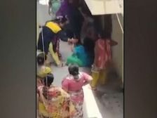 యజమానికి సహకరించిందని పని మనిషి దుస్తులు చింపి దారుణంగా కొట్టారు, అర్ధనగ్నంగా పరుగులు (వీడియో)