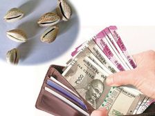 New Year 2023: కొత్త సంవత్సరం రోజున ఈ వస్తువులు మీ పర్సులో పెట్టుకుంటే డబ్బే డబ్బు.. ట్రై చేయండి..