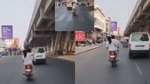 రియల్ ఇండియన్ పెళ్లాం: కదులుతున్న బండిమీద మహిళ చేసిన పనికి షాక్..వీడియో చూడండి