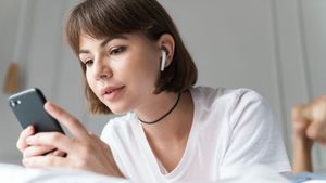 Are Your Earbuds Slowly Damaging Your Hearing? A Surgeon Explains What's Really Happening