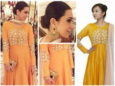 ಕಿತ್ತಳೆ ಬಣ್ಣದ ದಿರಿಸಿನಲ್ಲಿ ಕಣ್ಮನ ಸೆಳೆದ ಕರಿಶ್ಮಾ ಕಪೂರ್