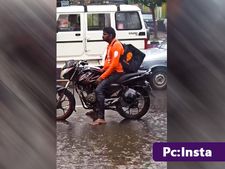 ಮಳೆಯಲ್ಲಿ ನೆನೆಯುತ್ತಿರುವ ಫುಡ್‌ ಡೆಲಿವರಿ ಬಾಯ್‌: ನೆಟ್ಟಿಗರ  ಮನ ಕಲಕಿದ ದೃಶ್ಯ 