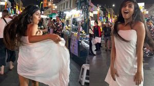 Viral Video: నైట్ మార్కెట్‌ లో టవల్‌ కట్టి డాన్స్ చేసిన మహిళ..ఊడిపోతున్నా  కూడా..