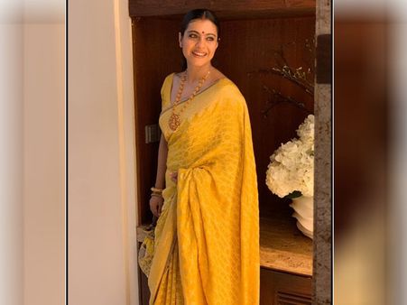 হলুদ শাড়িতে কাজল