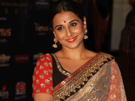 Vidya's tight bun Vidya's tight bun