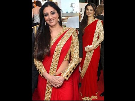 Tabu in vermilion red saree