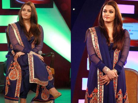 In blue and golden suit