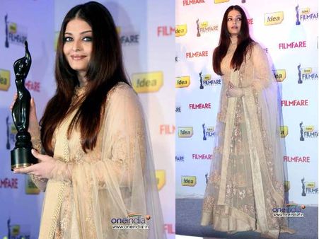 In a beige long anarkali