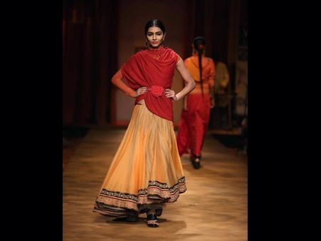 Cream and orange lehenga
