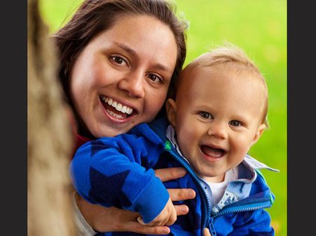 Cuddle And Play With The Baby