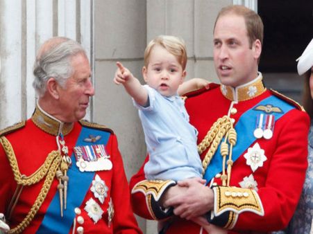 Prince George In Father's Arms