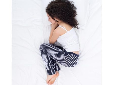 Sleeping On Sides With Legs Touching The Chest