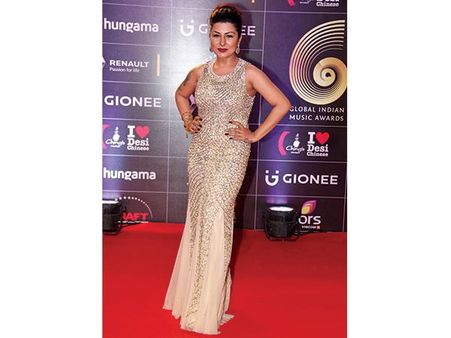 Hard Kaur In A Gold Dress