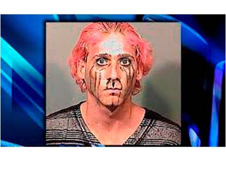 Dressed As “The Joker”