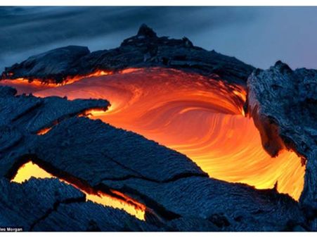 A Massive River Of Lava Flowing Into The Ocean 