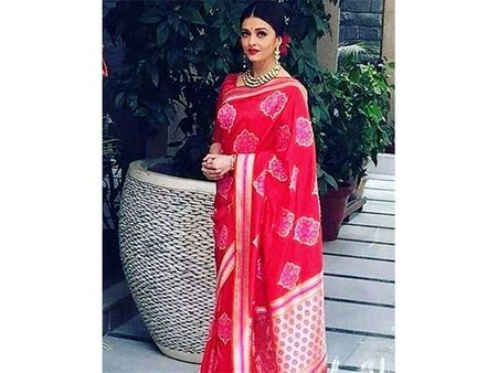 In Swati & Sunaina Red Saree