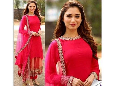 In Sabyasachi Red Suit