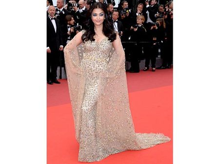 8. Wearing a lavish purple gown at At amfAR gala Image Courtesy