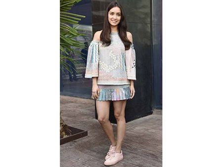 7. With Pleated Mini Skirt