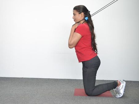 4. Kneeling Crunch: