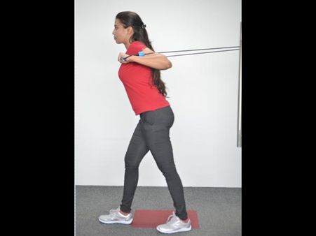 12. Standing Chest Press: