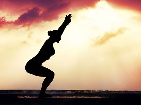 1. Utkatasana (The Chair Pose)