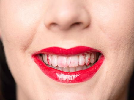 11. Avoid Lipstick On Your Teeth: