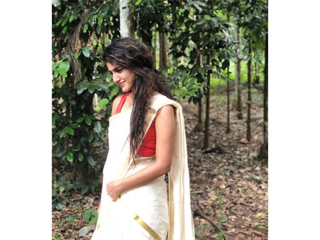 Priya's Traditional Cream And Gold Sari