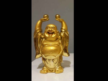 5. A Laughing Buddha With Both Hands Raised