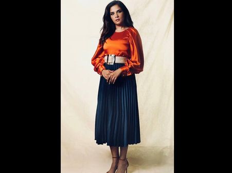 Richa Chadha In An Orange Top And Blue Skirt