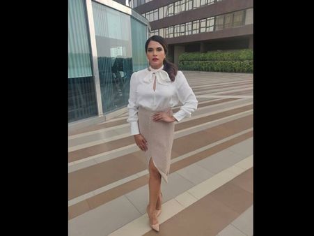 Richa Chadha In A White Shirt And Beige Skirt