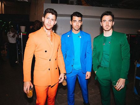Nick Jonas In An Orange Suit