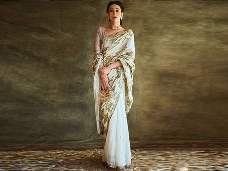 Karisma Kapoor’s Golden Embellished Ivory Sari