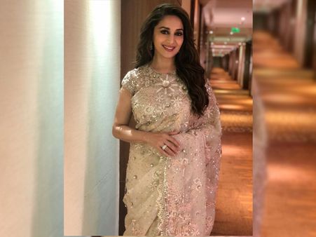 Madhuri Dixit’s Silver-Golden Embellished Ivory Sari