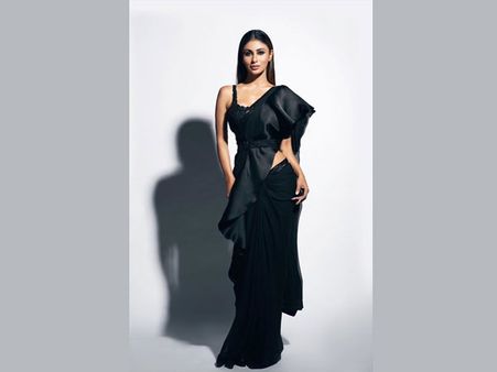 Mouni Roy In A Black Ruffle Belted Sari