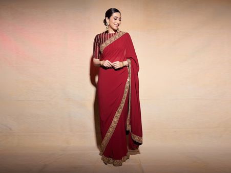 Karisma Kapoor’s Blood Red Sari And Striped Blouse