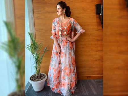 Zareen Khan’s Orange Crop Top, Organza Skirt And Shrug Zareen Khan’s Orange Crop Top, Organza Skirt And Shrug