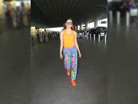 Urvashi Rautela In A Mustard Tee And Funky Denims