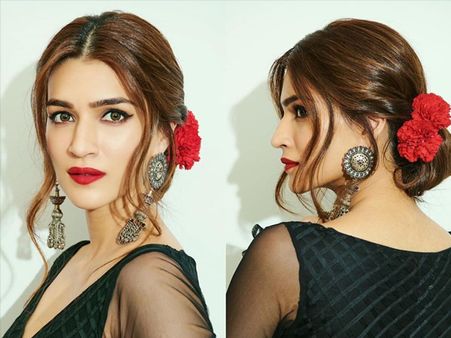 Kriti Sanon’s Looped Low Bun With Red Roses