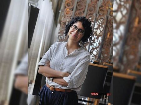 Kiran Rao In A Checkered Shirt And Trousers