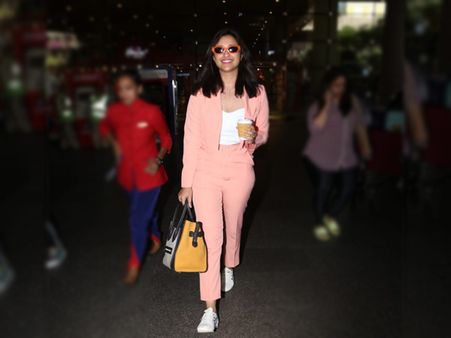 Parineeti Chopra In A Neon Peach Pantsuit