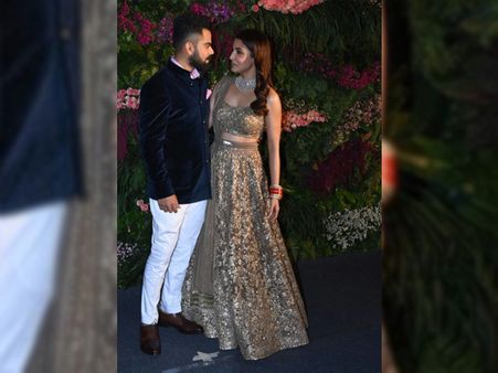 Virat Kohli And Anushka Sharma's Mumbai Reception Outfits
