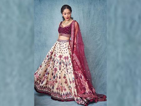 Nushrat Bharucha In A Maroon-Cream Lehenga