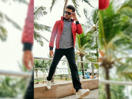 Riteish Deshmukh In Striped T-shirt And Red Jacket