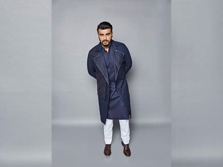Arjun Kapoor In A Midnight-blue Kurta Set And Trench Coat