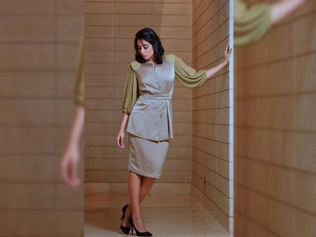 Regina Cassandra In A Grey Ensemble