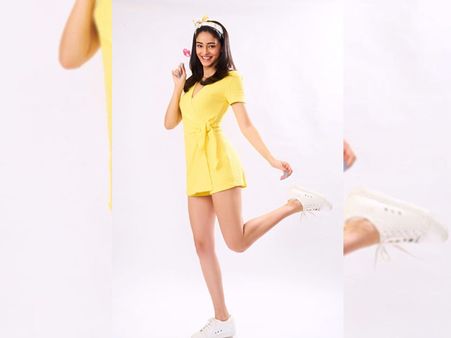Ananya Panday In A Yellow Wrap Mini Dress