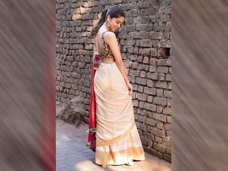 Sharvari In An Ivory and Garnet-Red Sari