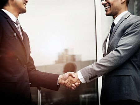 6. Intense Glare Handshake